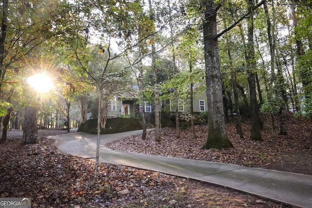 view of property hidden behind natural elements