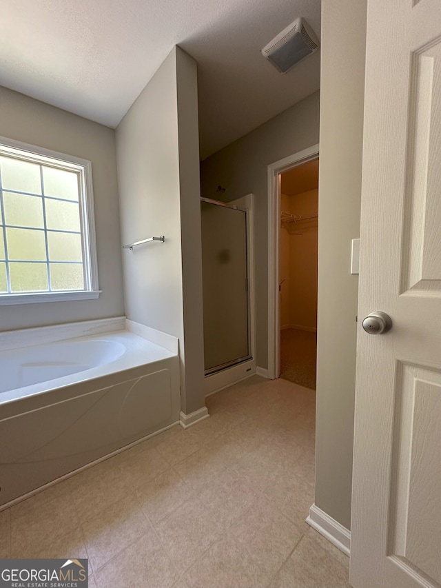 bathroom with plus walk in shower