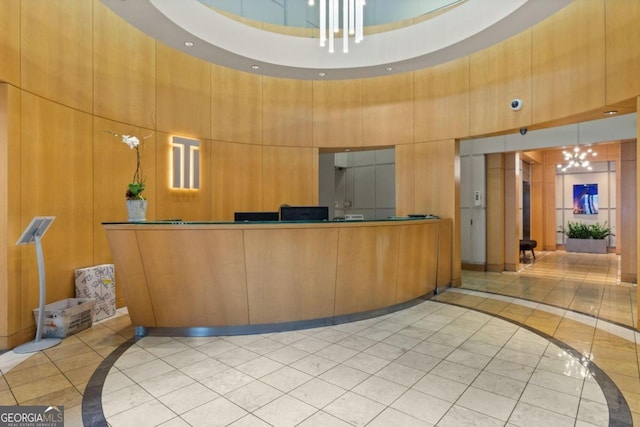 reception area with an inviting chandelier