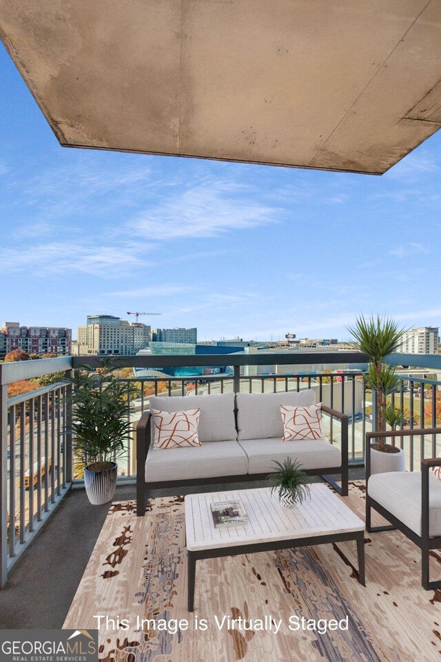 balcony featuring an outdoor living space