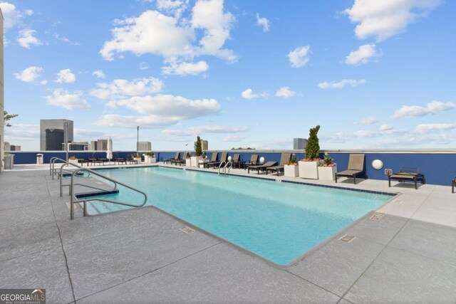 view of pool with a patio area