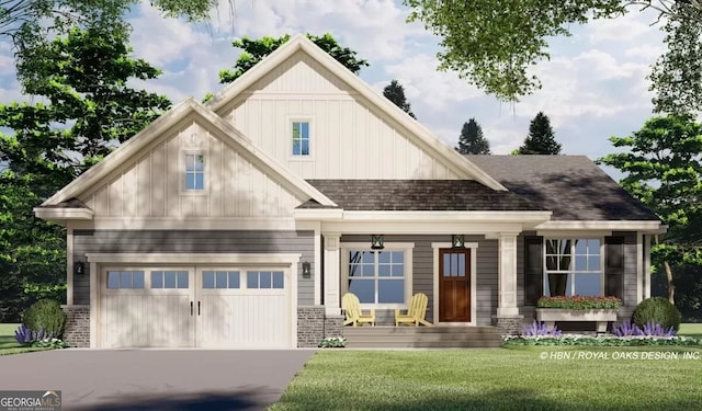 craftsman-style house featuring board and batten siding, concrete driveway, a front yard, a shingled roof, and brick siding