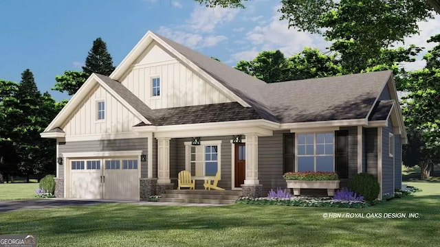 view of front of home with a garage and a front lawn