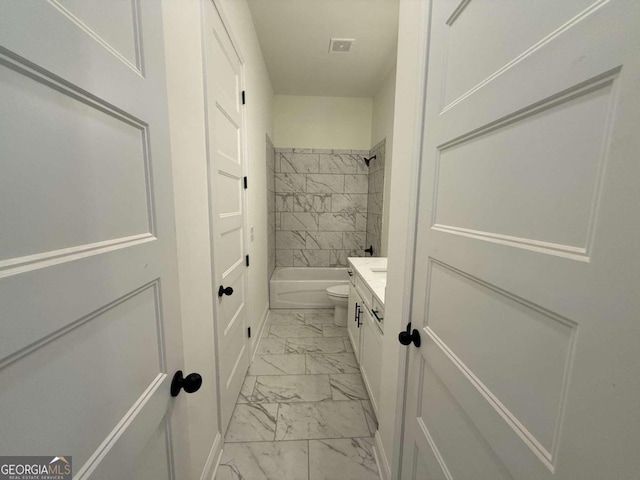 full bathroom featuring vanity, toilet, and shower / bath combination