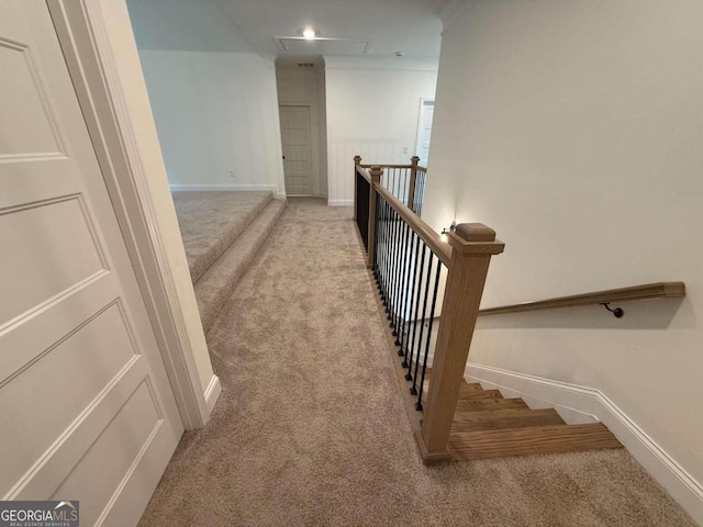 hallway with light colored carpet