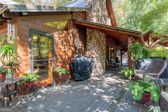 wooden terrace with grilling area