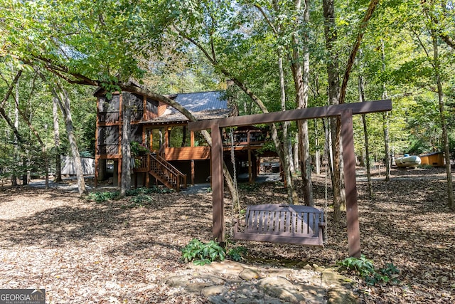 view of yard featuring a wooden deck