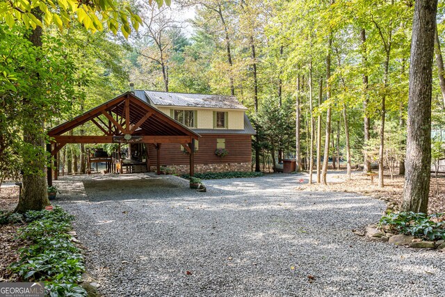 view of front of property with a carport