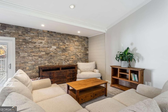 carpeted living room with a fireplace and ornamental molding