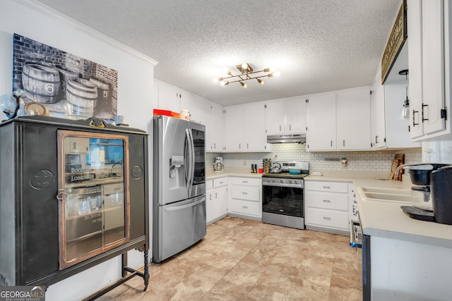 kitchen with sink, white cabinets, a textured ceiling, and appliances with stainless steel finishes