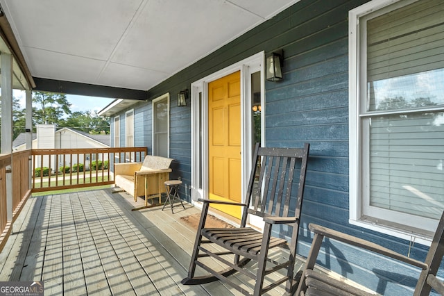 wooden deck with covered porch