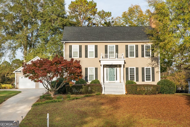 colonial home featuring a balcony