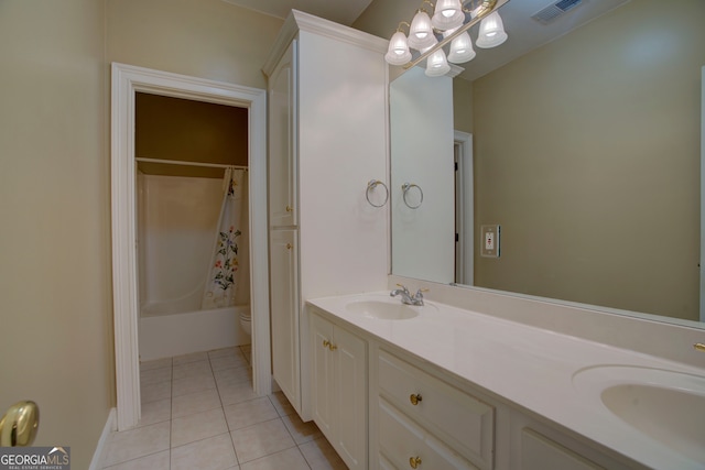 full bathroom with toilet, vanity, tile patterned floors, and shower / bath combo with shower curtain