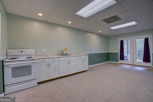 kitchen featuring white cabinetry, french doors, sink, white range with electric stovetop, and a paneled ceiling