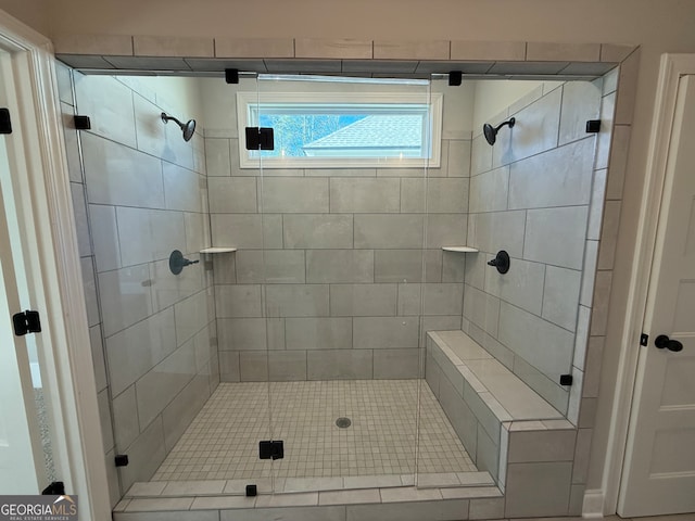 bathroom featuring an enclosed shower