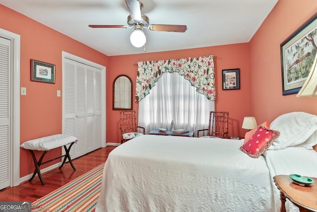 bedroom with ceiling fan, a closet, and hardwood / wood-style flooring