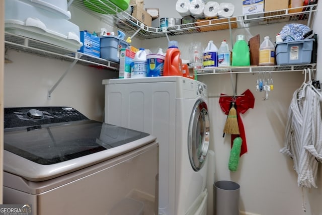 laundry area with washer and clothes dryer