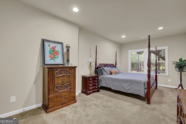 bedroom with light carpet