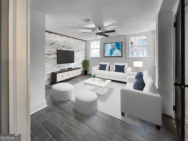 living room with ceiling fan and dark hardwood / wood-style floors