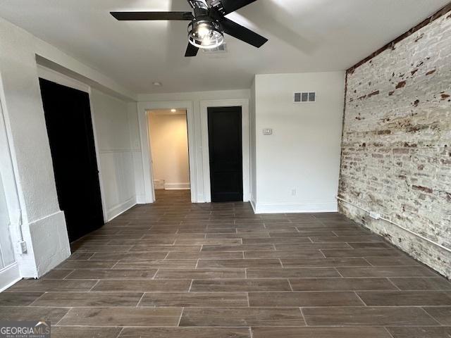 spare room featuring ceiling fan