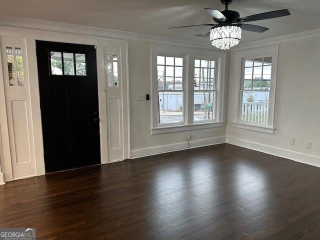 entryway with ornamental molding, plenty of natural light, dark wood-type flooring, and ceiling fan