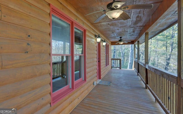 wooden deck with ceiling fan