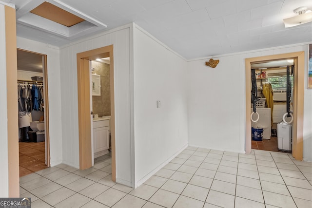 650 Mccharles St, Dalton, GA 30720 - corridor featuring light tile patterned floors and washer / clothes dryer