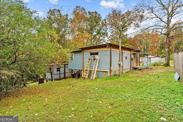 650 Mccharles St, Dalton, GA 30720 - back of property featuring a yard