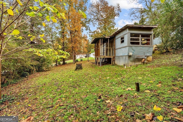 650 Mccharles St, Dalton, GA 30720 - view of yard with a sunroom