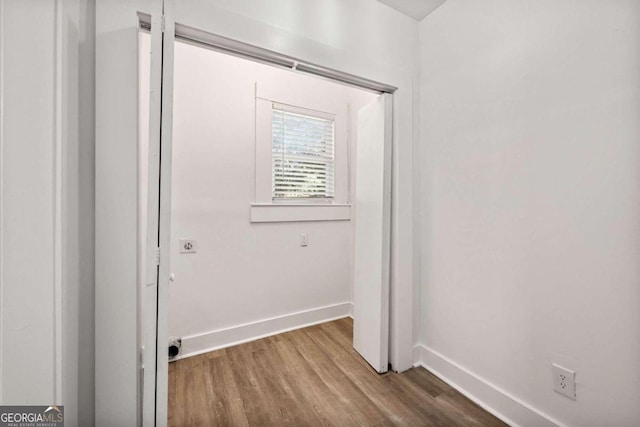 washroom featuring wood-type flooring