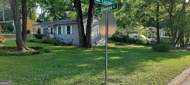 view of home's exterior featuring a yard