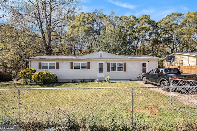 ranch-style home with a front yard