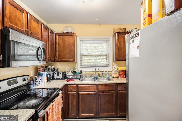 kitchen featuring sink and stainless steel appliances