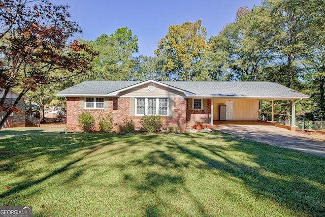 ranch-style house featuring a front lawn and a carport