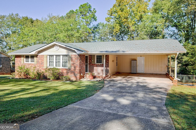 single story home with a front yard and a carport