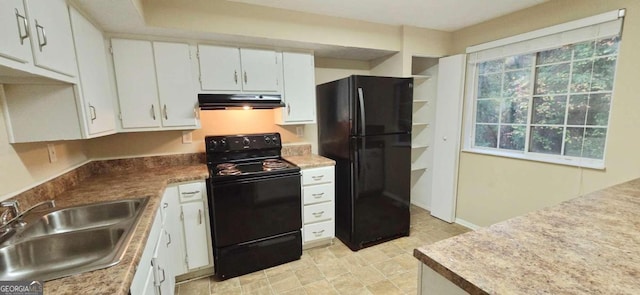 kitchen with sink, white cabinetry, and black appliances