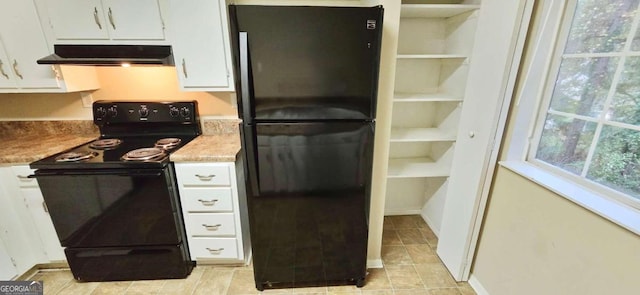 kitchen with white cabinets and black appliances