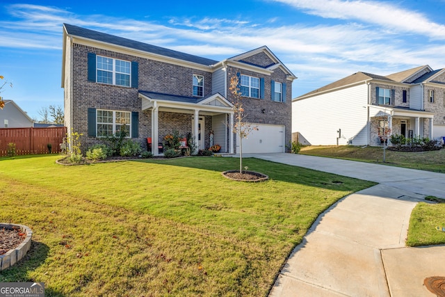 view of front of home featuring a garage and a front lawn