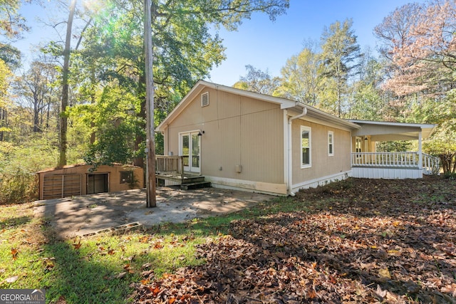 465 Haynie Rd, Moreland, GA 30259 - back of property featuring an outdoor structure and a porch