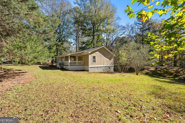 465 Haynie Rd, Moreland, GA 30259 - view of grassy yard with a porch