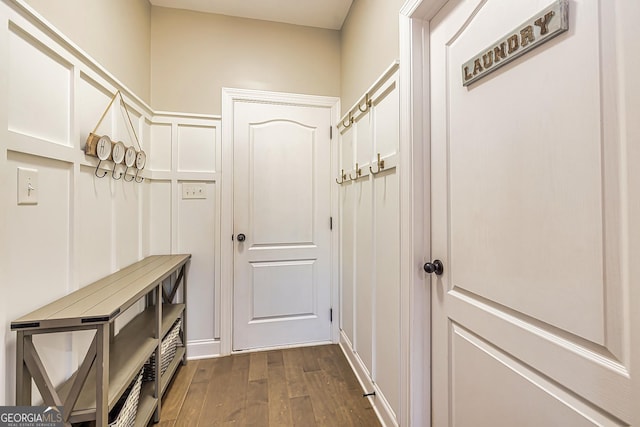 mudroom featuring dark wood-type flooring