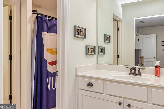 bathroom featuring vanity