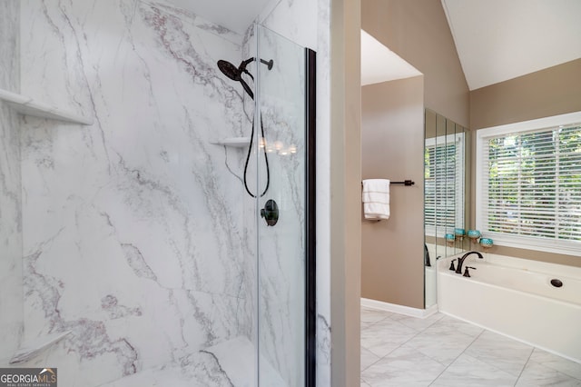 bathroom with independent shower and bath and lofted ceiling