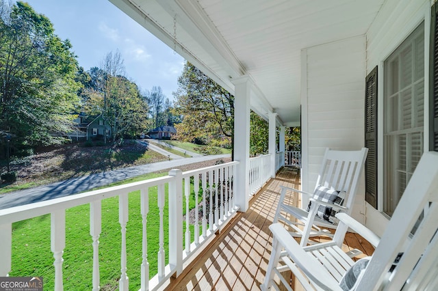 balcony featuring covered porch