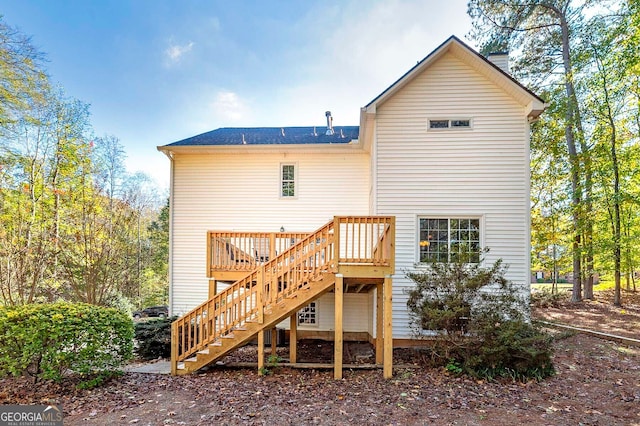 rear view of house with a deck