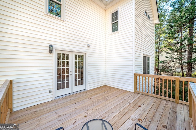 wooden terrace featuring french doors