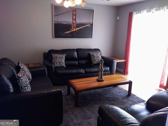 living room featuring ceiling fan