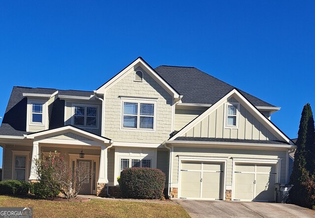 craftsman-style house with a garage