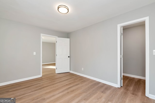 unfurnished bedroom featuring light hardwood / wood-style flooring