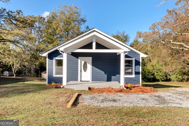 view of outbuilding featuring a yard